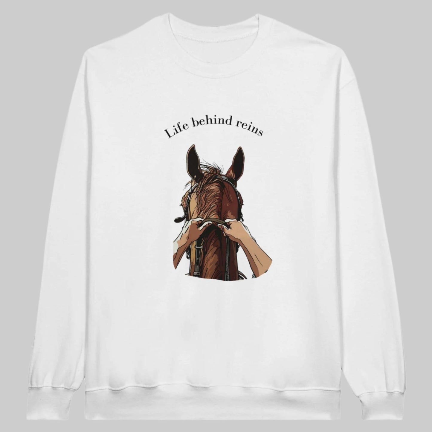 White sweatshirt with "Life Behind Reins" design featuring a horse and reins for horseback riding enthusiasts