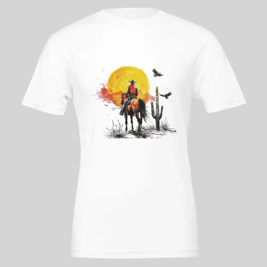 White t-shirt featuring a cowboy and horse design against a vivid desert sunset, ideal for fans of cowboy culture.

